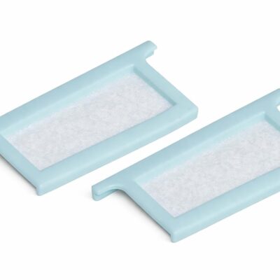 Two light blue DreamStation 1 disposable filter trays with white ultra-fine filter media, side view