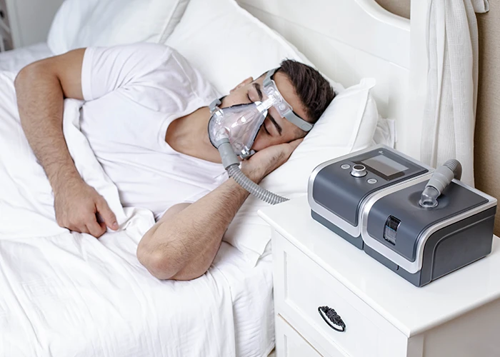 BMC RESmart GII Auto CPAP Machine (G2) beside the bed during overnight therapy