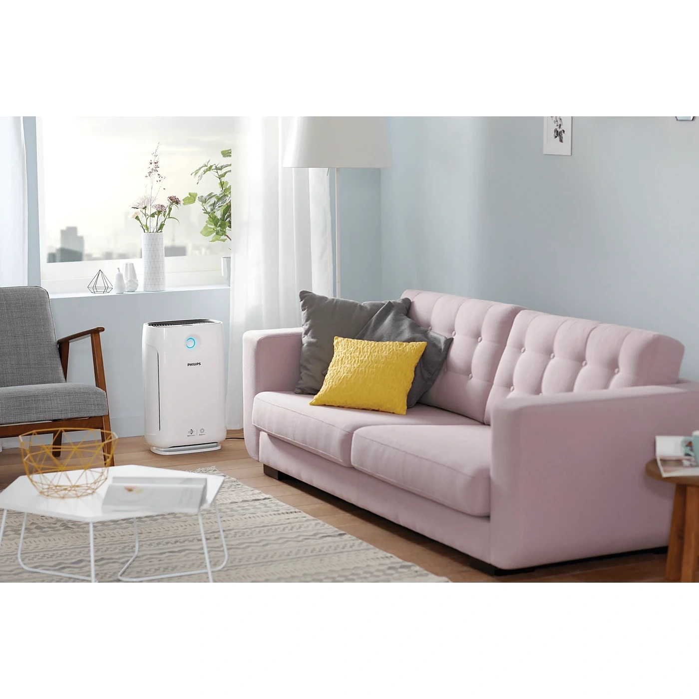 Philips AC2887/20 air purifier placed in a living room corner near a sofa