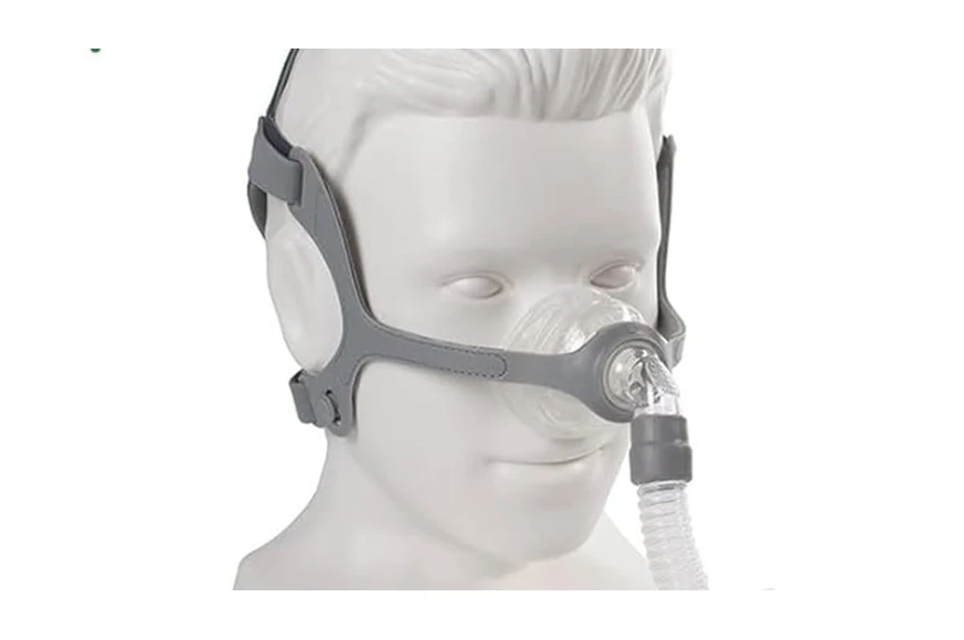 BMC N5A nasal mask on mannequin head, angled side view, showing frame-free headgear routing