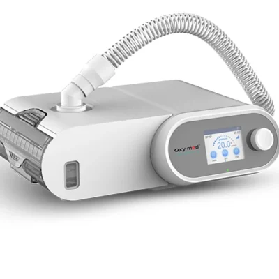 Oxymed SleepEasy Auto CPAP machine, angled view with tubing